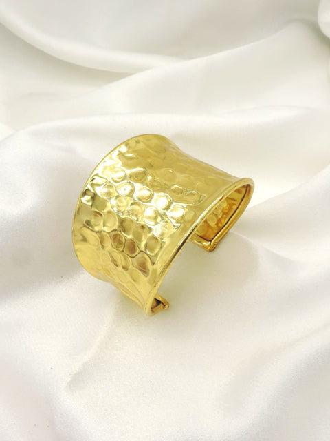 Hammered gold wide cuff bracelet by Joyrias