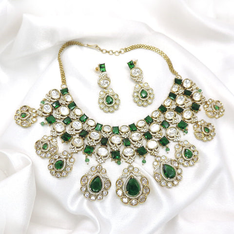 Emerald green AD CZ necklace set with clustered stone detailing and matching earrings by joyrias