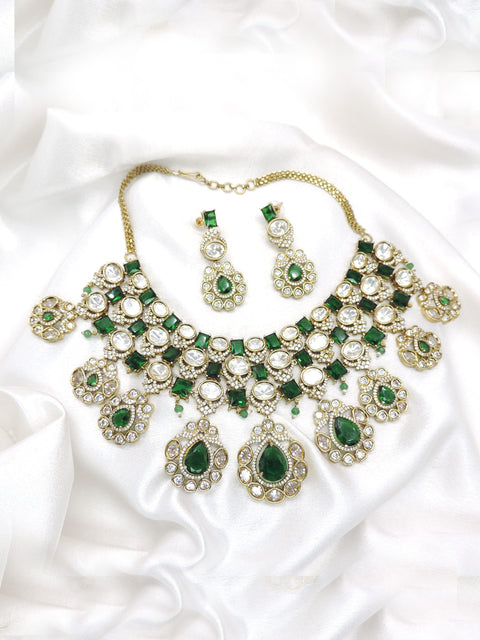 Emerald green AD CZ necklace set with clustered stone detailing and matching earrings by joyrias