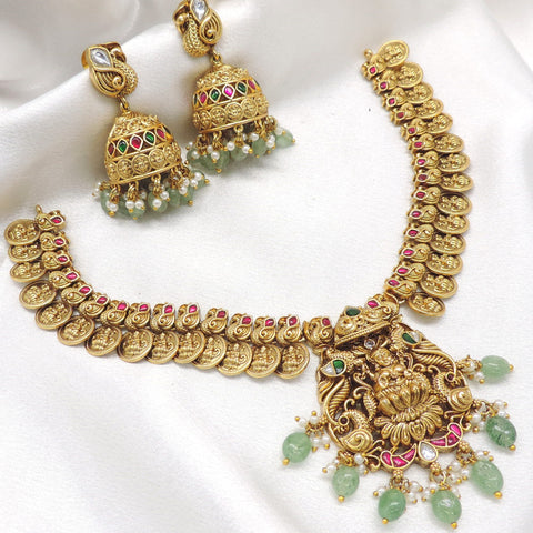Gold plated ruby emerald temple necklace set with coin motifs and jhumka earrings by joyrias
