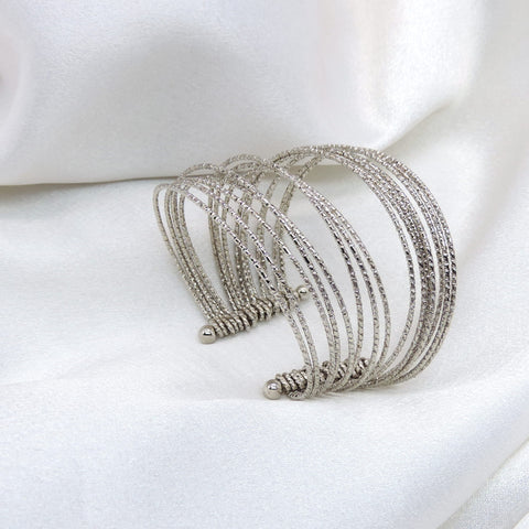 Oxidized silver multi-layer cuff bracelet with textured and twisted detailing by joyrias