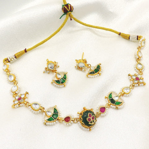 Green kundan choker set by Joyrias