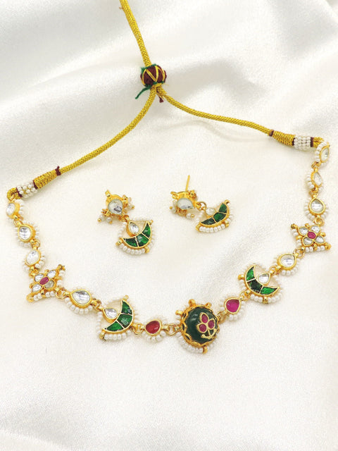 Green kundan choker set by Joyrias