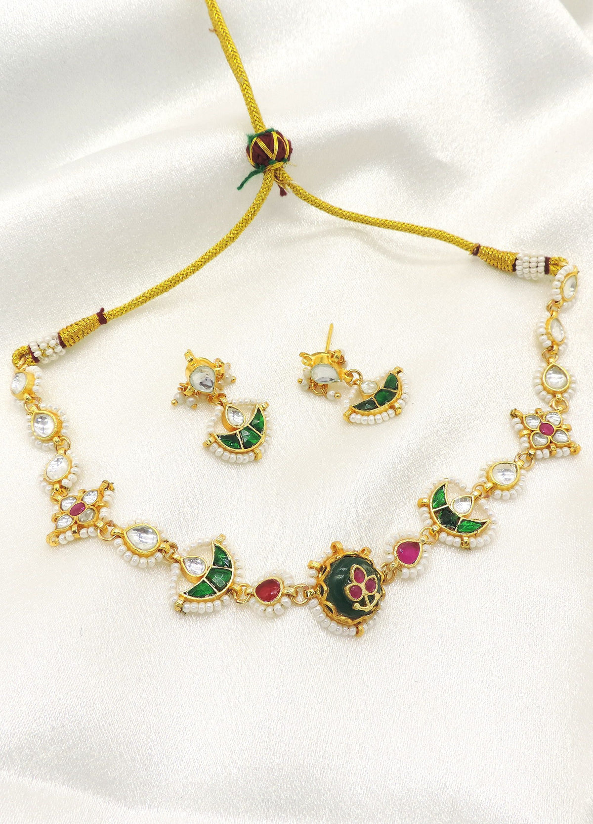 Green kundan choker set by Joyrias