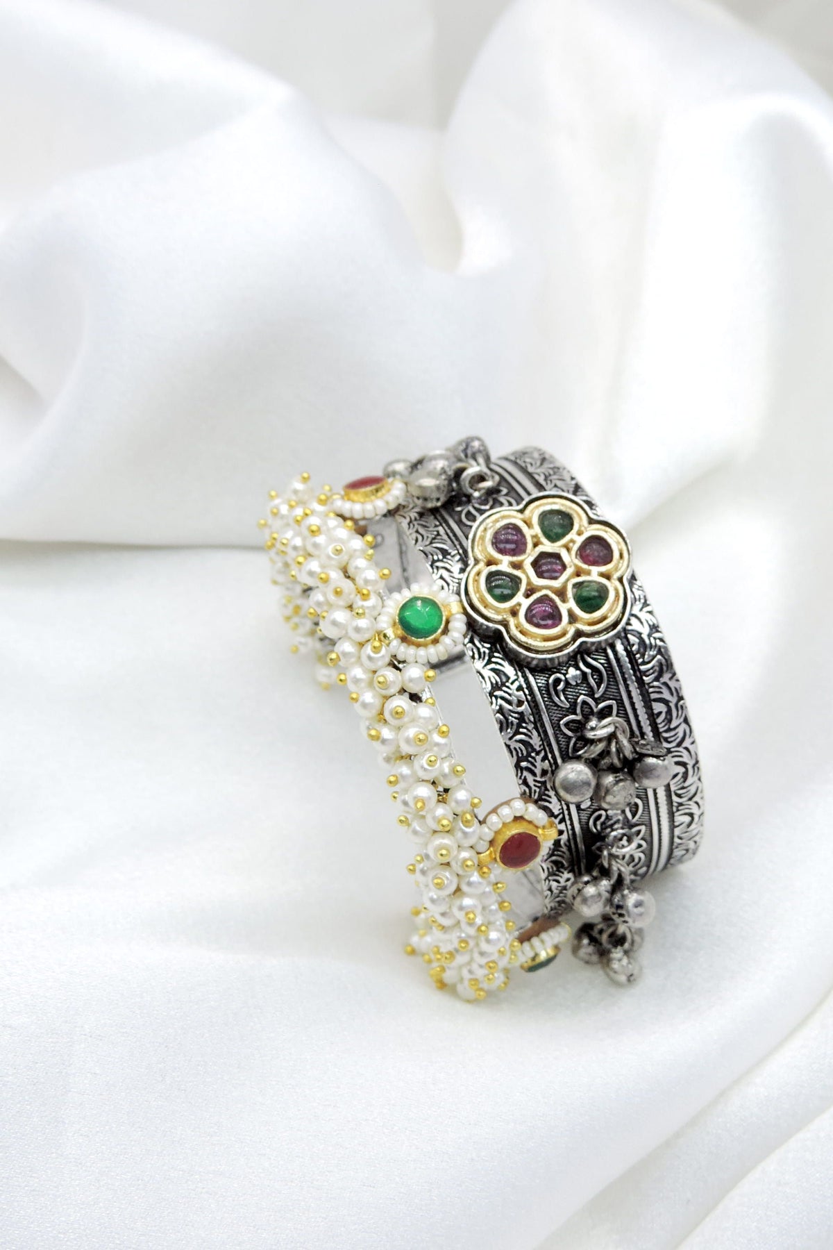 Oxidized dual-tone silver gold green pink pearl cuff bracelet with ornate floral detailing by joyrias