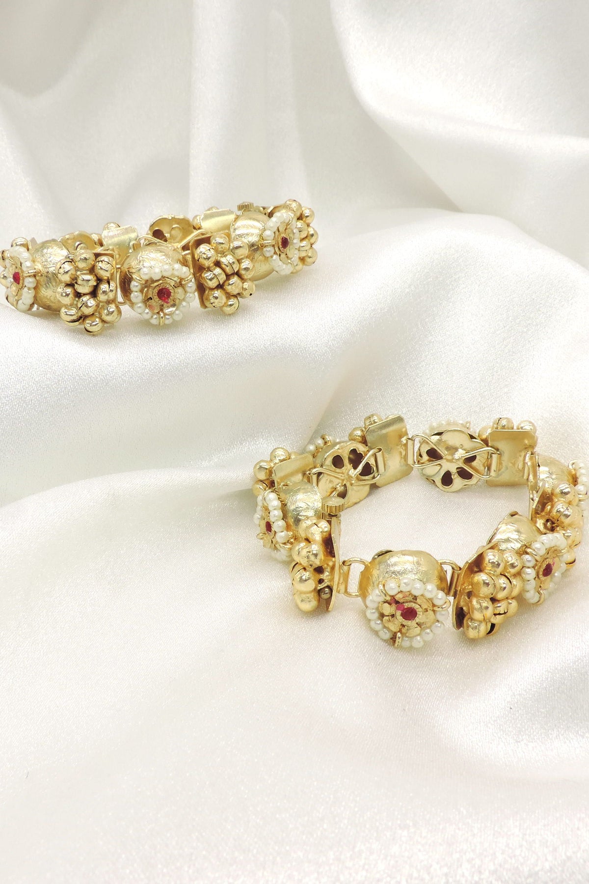 Antique pearl floral bangles by Joyrias