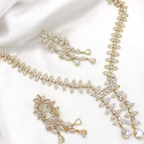Radiant floral CZ necklace set with sparkling accents and matching earrings by joyrias