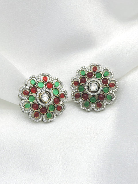 Multicolor kundan floral earrings with green and maroon stone detailing by joyrias