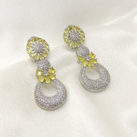 Yellow floral drop earrings by Joyrias