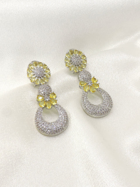 Yellow floral drop earrings by Joyrias