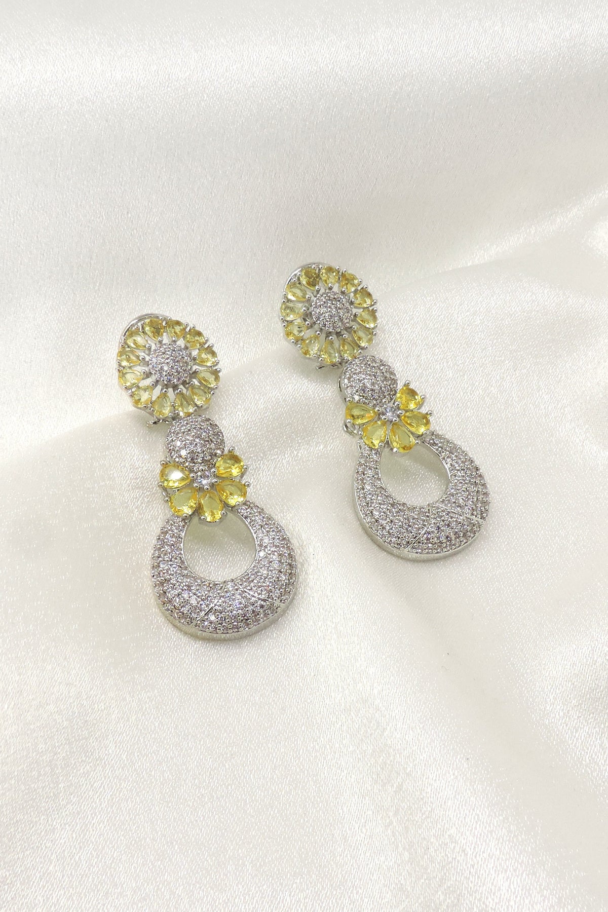Yellow floral drop earrings by Joyrias