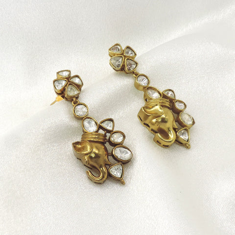 Ganesha kundan drop earrings by Joyrias