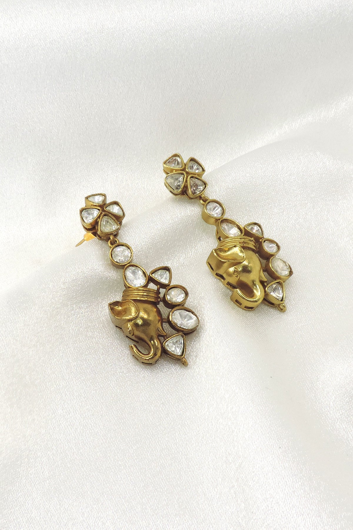 Ganesha kundan drop earrings by Joyrias
