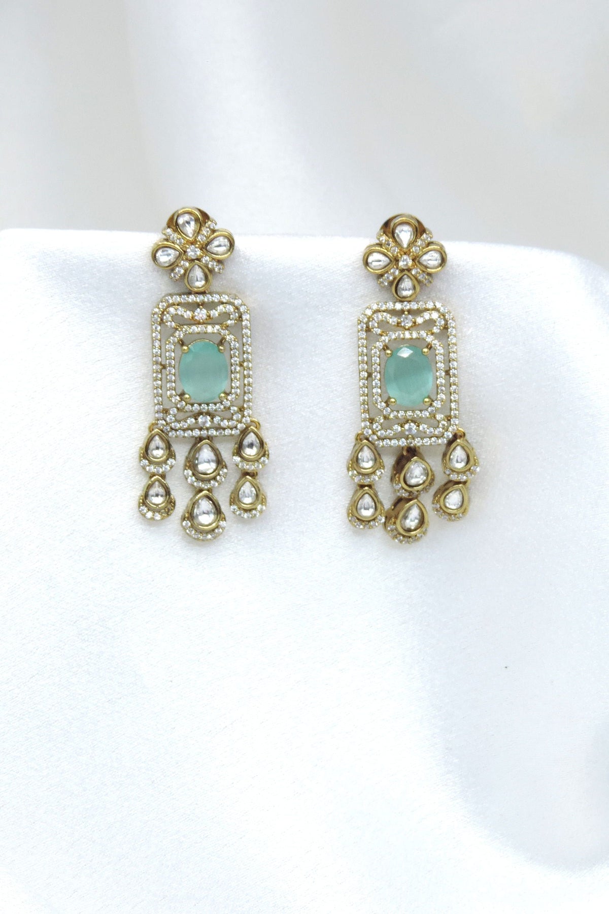 Royal kundan mint green drop earrings with CZ detailing by joyrias
