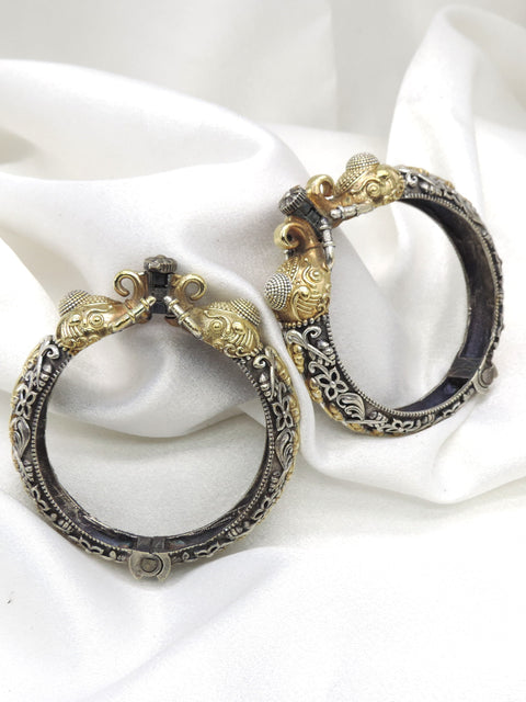 Oxidized dual-tone elephant floral bangle set with gold silver detailing by joyrias
