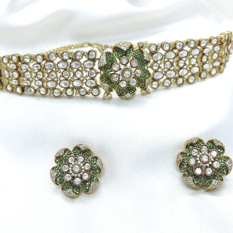 Kundan choker necklace set with floral stud earrings by joyrias