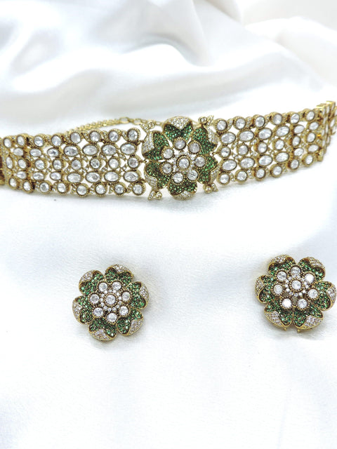 Kundan choker necklace set with floral stud earrings by joyrias