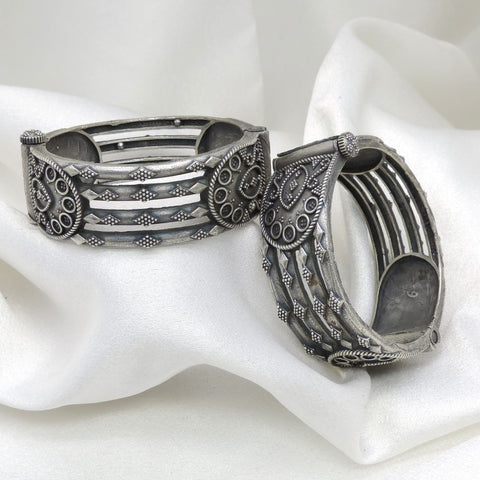 Oxidized silver tribal pattern openable bangle set with intricate detailing by joyrias