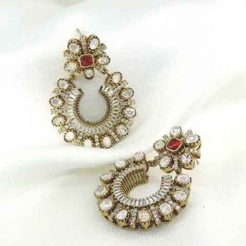 Ruby kundan hoop drop earrings by Joyrias