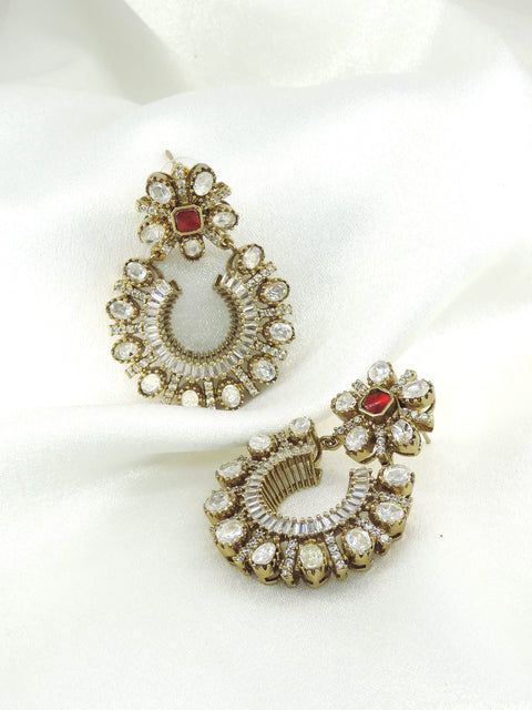 Ruby kundan hoop drop earrings by Joyrias