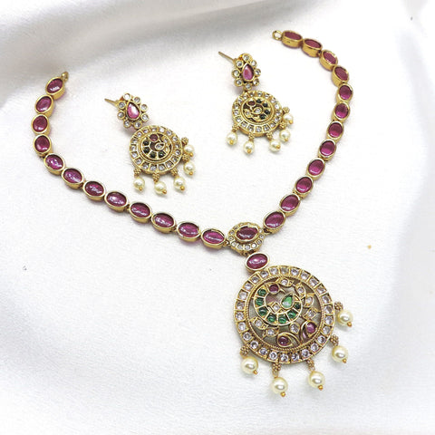 Ruby CZ AD necklace set with pearl drop detailing and gold-tone finish by joyrias