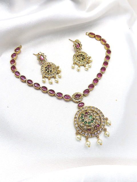 Ruby CZ AD necklace set with pearl drop detailing and gold-tone finish by joyrias
