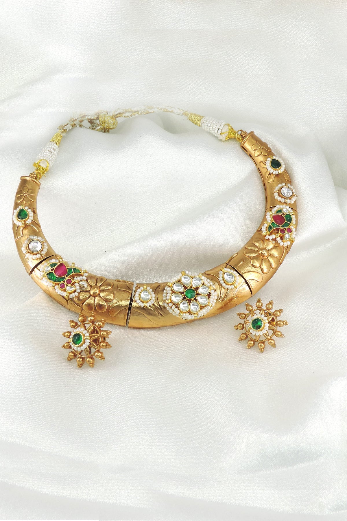 Floral kundan hasli necklace set by Joyrias
