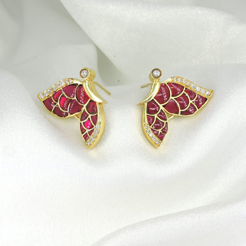 Ruby wing stud earrings by Joyrias