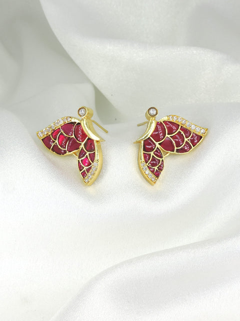 Ruby wing stud earrings by Joyrias