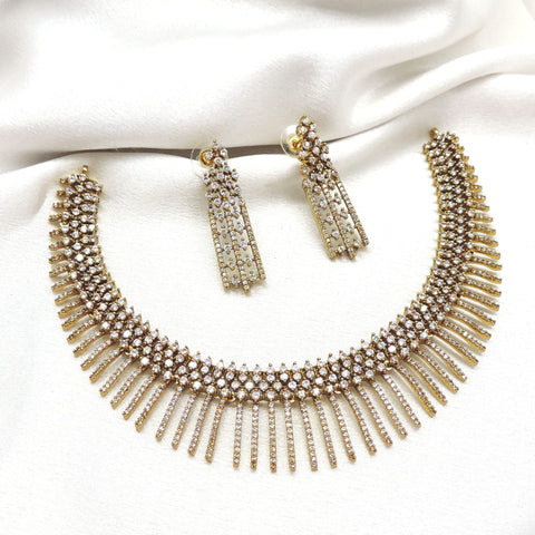 Gold-tone CZ AD fringe necklace set with matching long drop earrings by joyrias