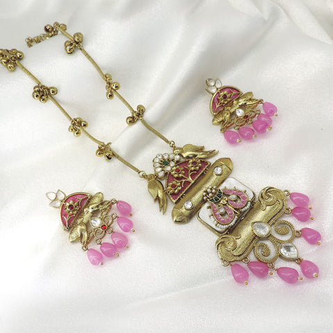 Pink bird pendant set by Joyrias