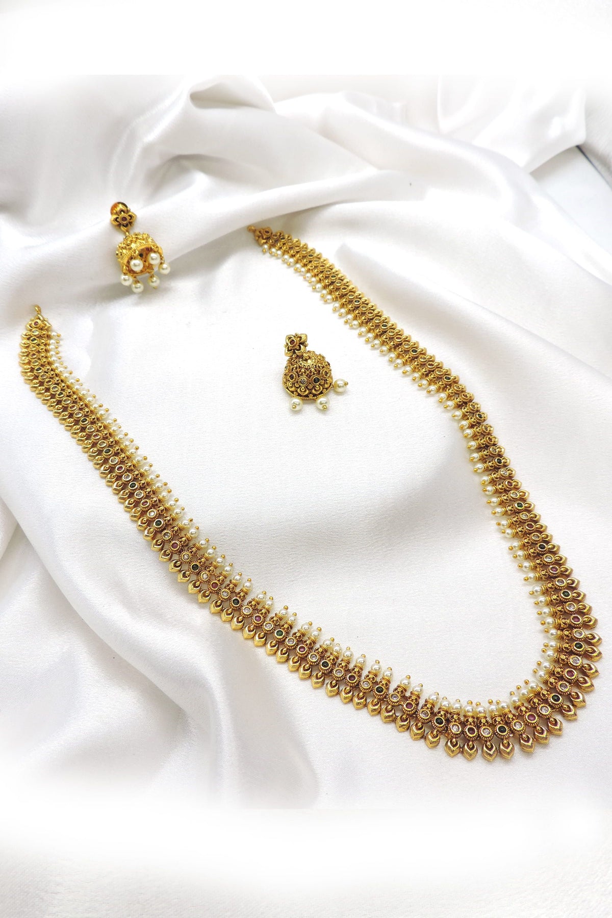 Heritage gold-tone traditional necklace set with pearl detailing and matching jhumka earrings