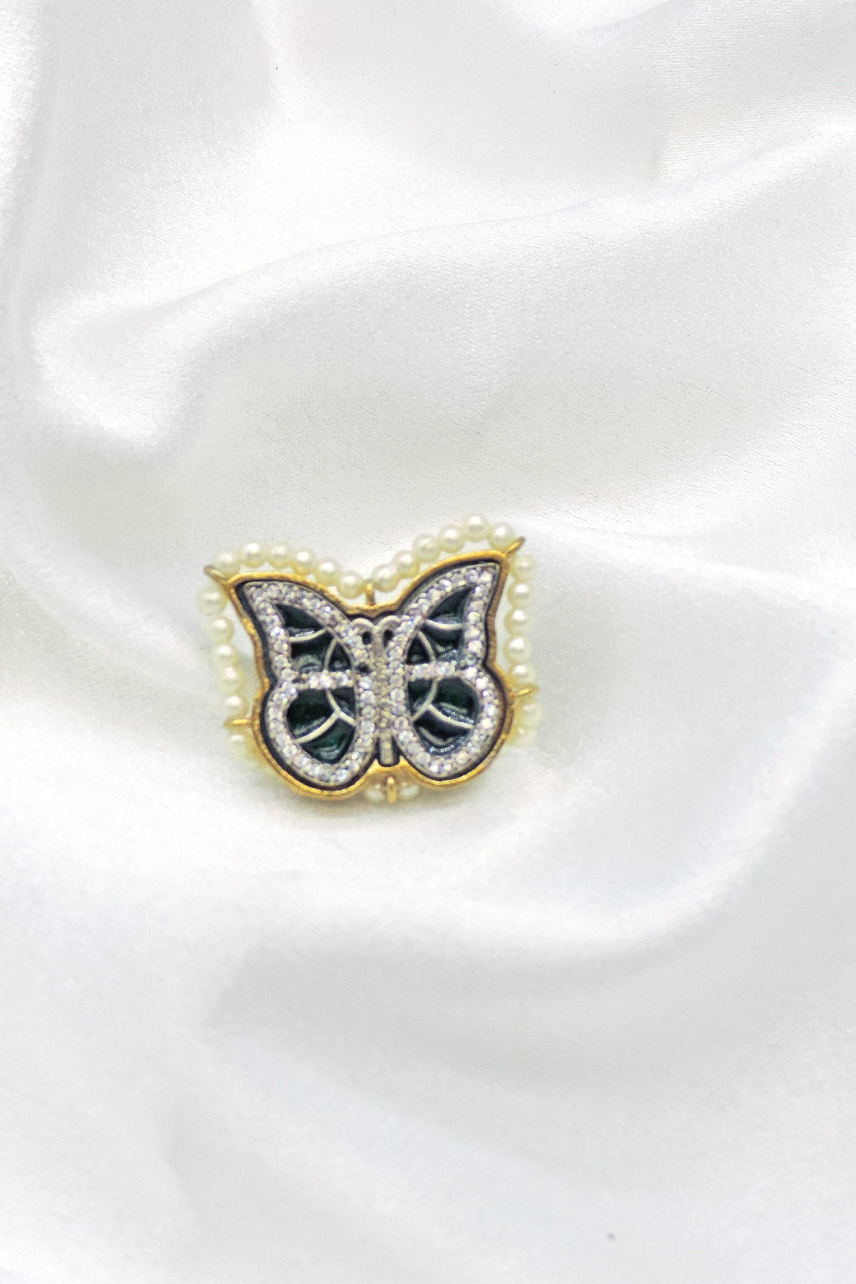 Oxidised butterfly ring with CZ detailing and pearl border from joyrias