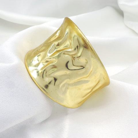 Molten gold sculpted cuff bracelet by Joyrias