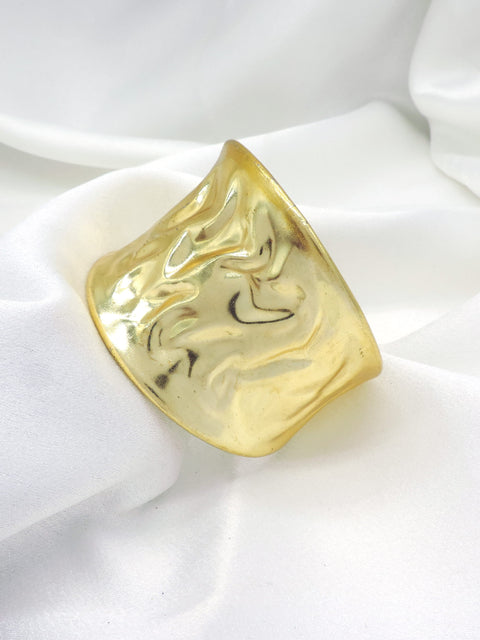 Molten gold sculpted cuff bracelet by Joyrias