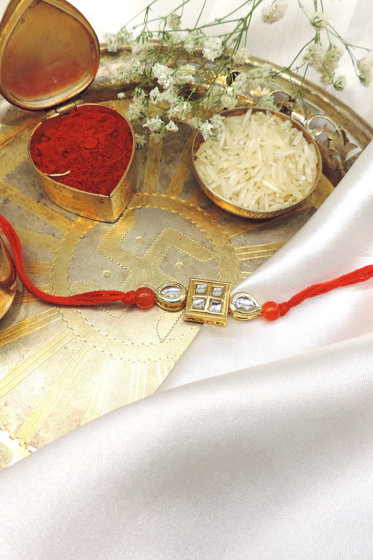 Elegant Kundan Square Rakhi with Red Thread | Handmade Raksha Bandhan Rakhi