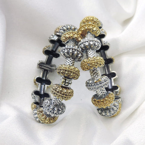 Oxidized dual-tone gold silver beaded bangle set with intricate textured detailing by joyrias