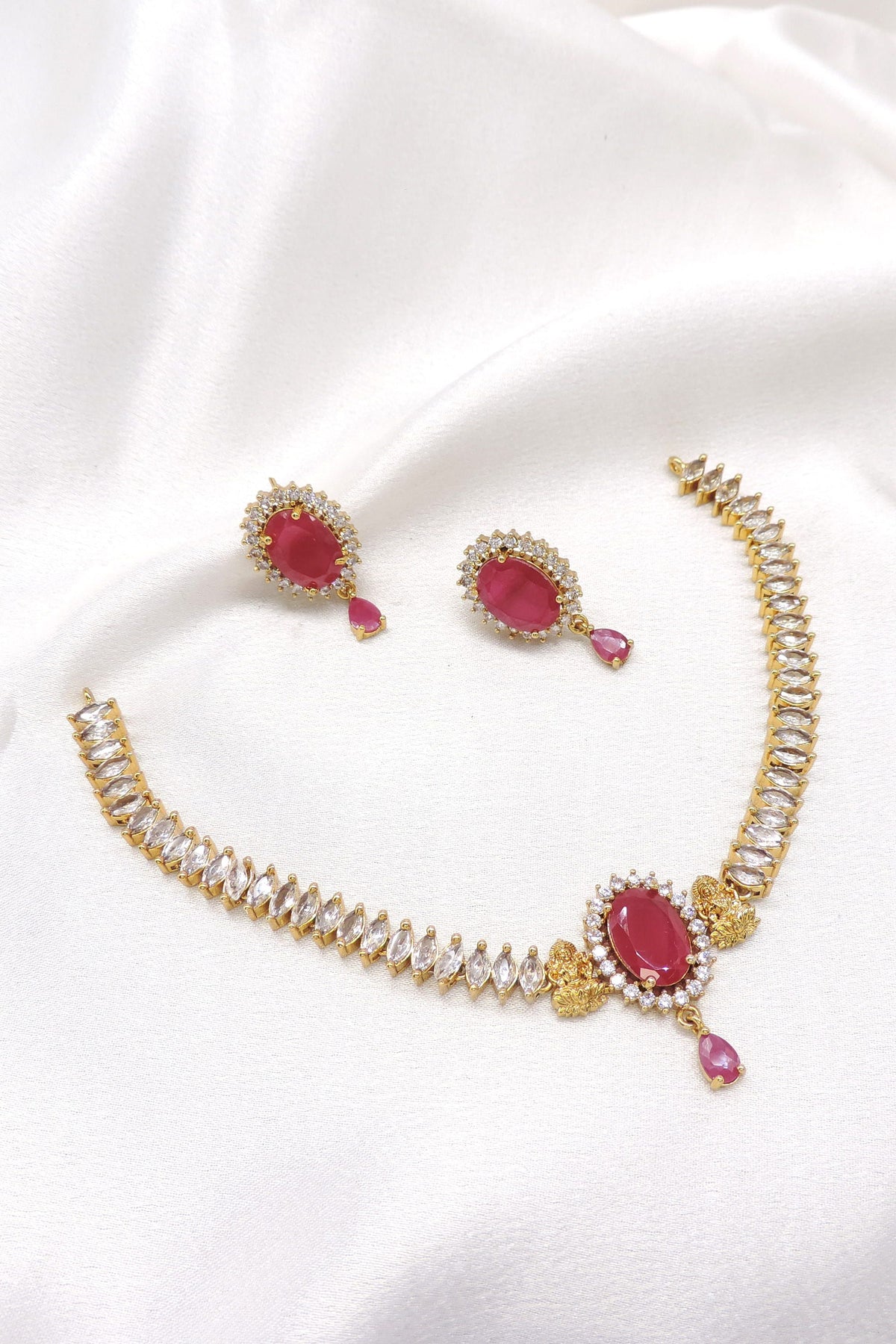 Royal ruby emerald kundan choker necklace set with matching long earrings by joyrias