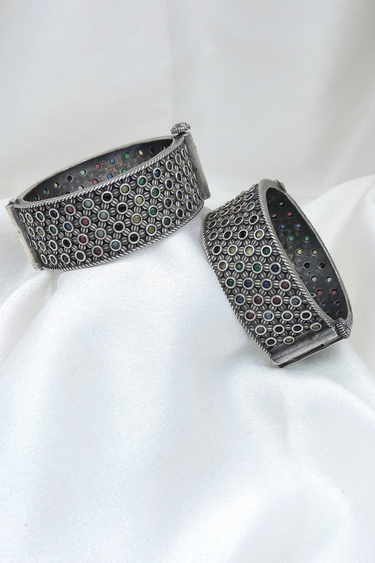 Oxidized silver multicolor floral bangle set with intricate openwork and colorful stone detailing by joyrias