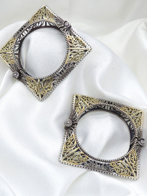 Oxidized dual-tone gold silver filigree bangle set with intricate openwork and traditional detailing by joyrias
