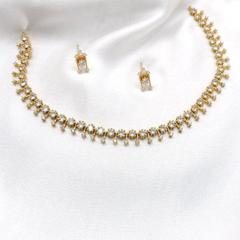 Gold-toned CZ dangling link necklace set with matching earrings by joyrias