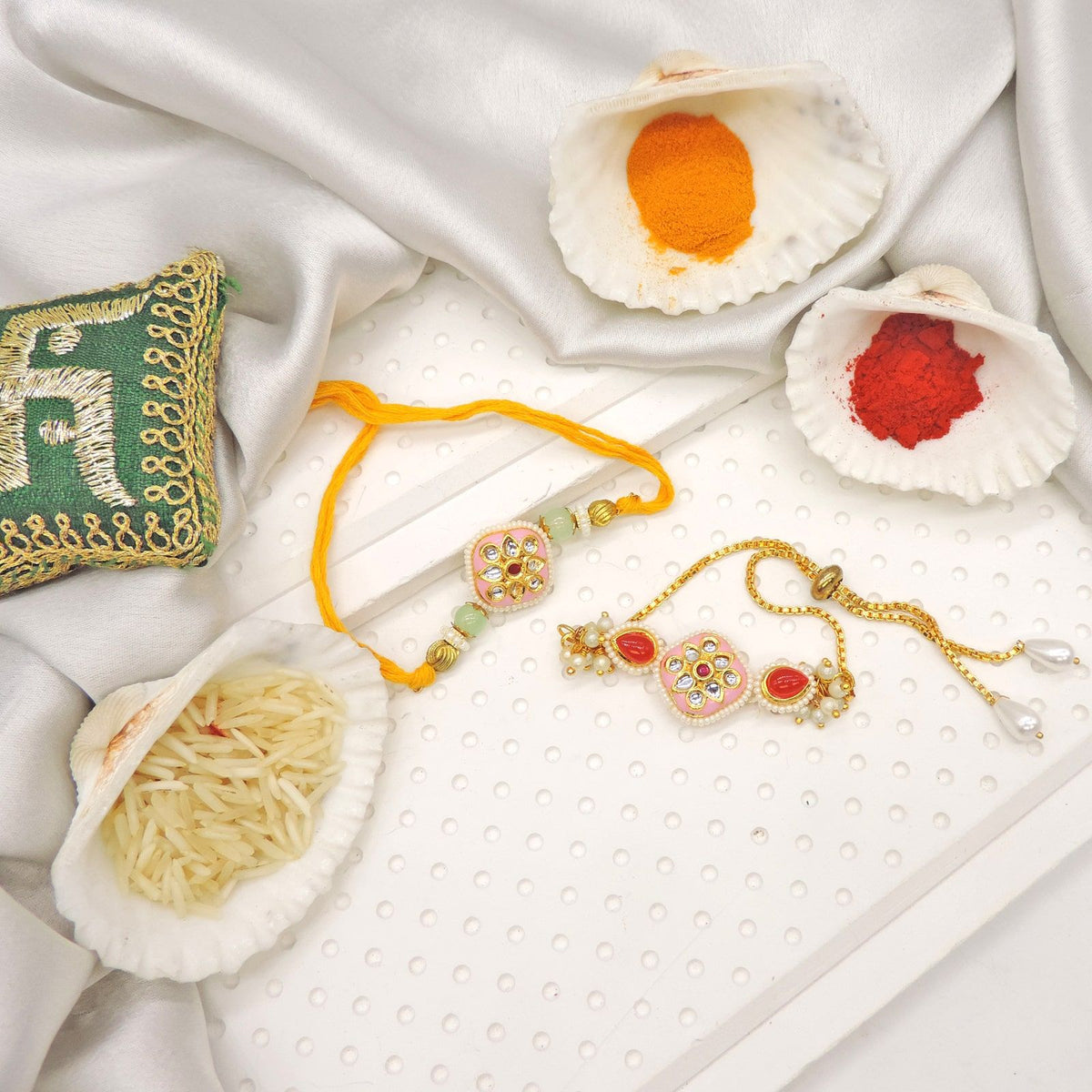 Pink Kundan Bhaiya Bhabhi Rakhi Set by Joyrias