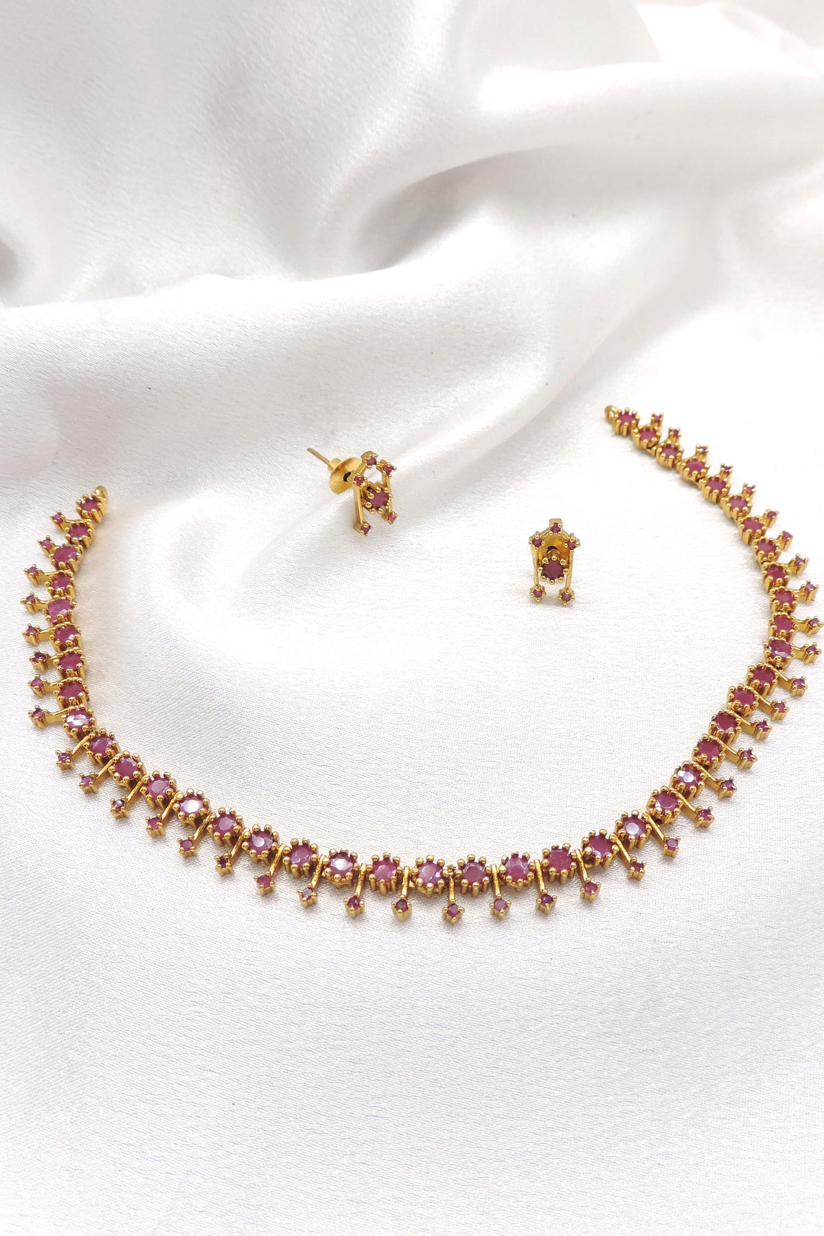Royal CZ AD ruby necklace set with matching ruby earrings by joyrias