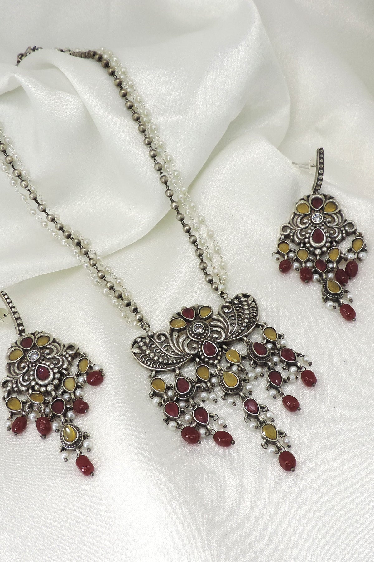 Mustard maroon necklace set by Joyrias