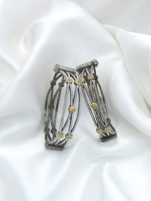 Oxidized dual-tone floral chain bangle set with gold-toned accents by joyrias