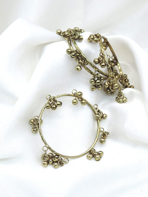 Gold-toned ghungroo openable bangle set with traditional bell detailing by joyrias