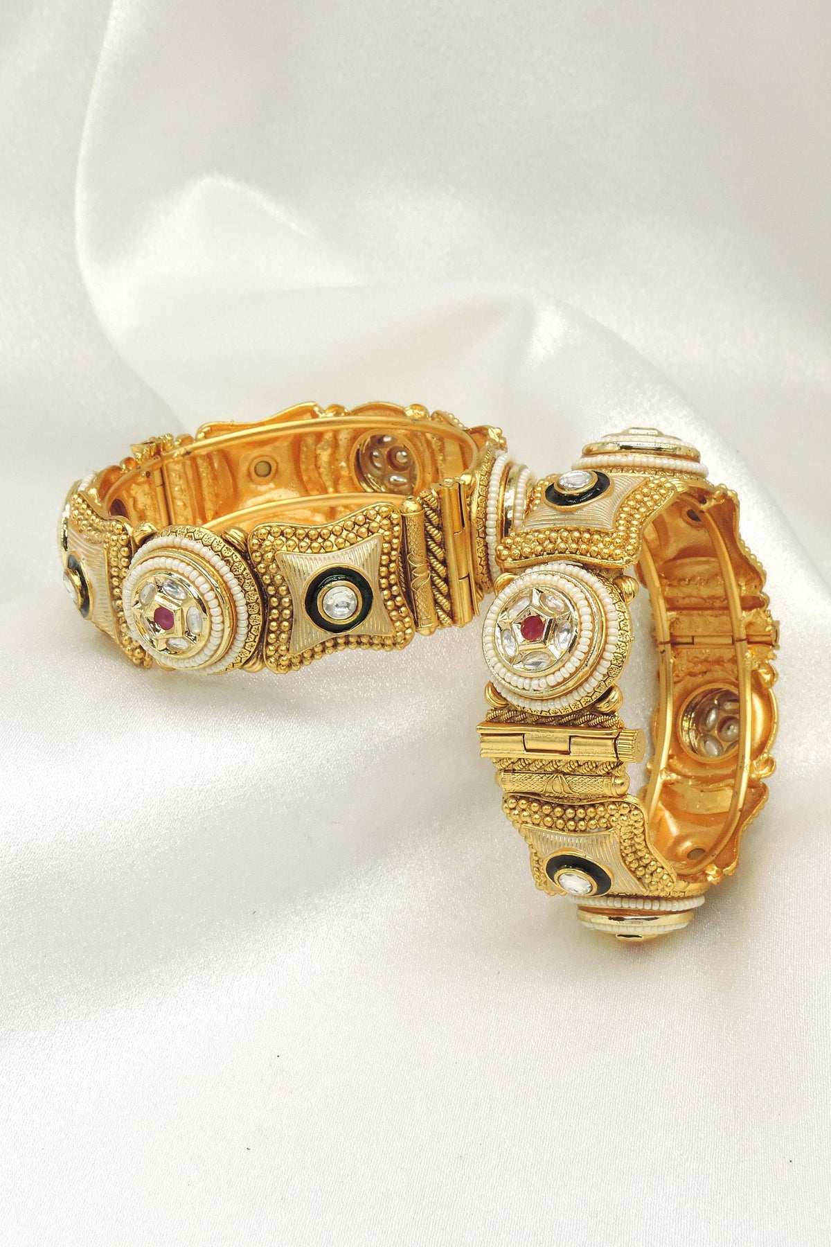 Antique kundan bangle set by Joyrias