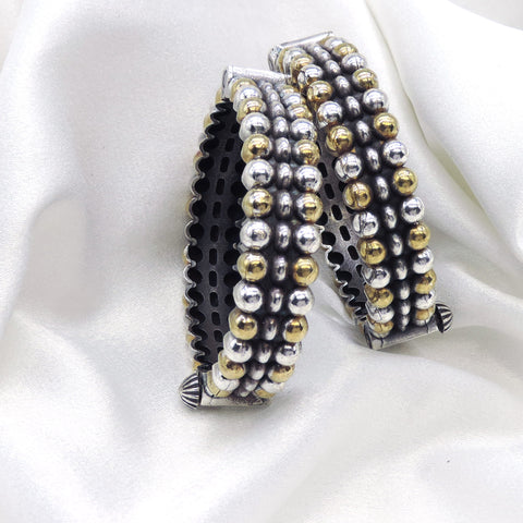 Oxidized dual-tone silver gold beaded bangle set with textured detailing by joyrias