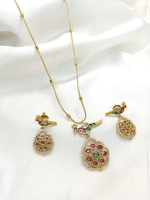 Traditional peacock kundan motif gold-tone pendant set