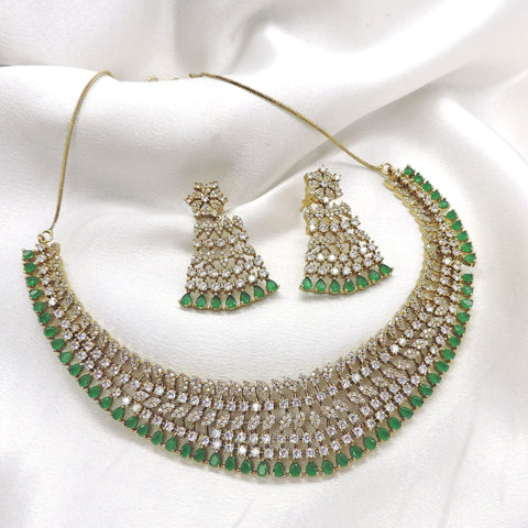 Royal green CZ AD choker necklace set with matching jhumka earrings by joyrias